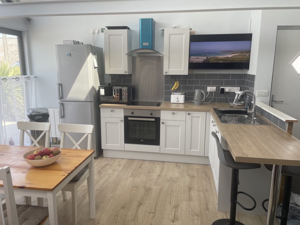 Open plan kitchen dining area, equipped for your self catering stay.