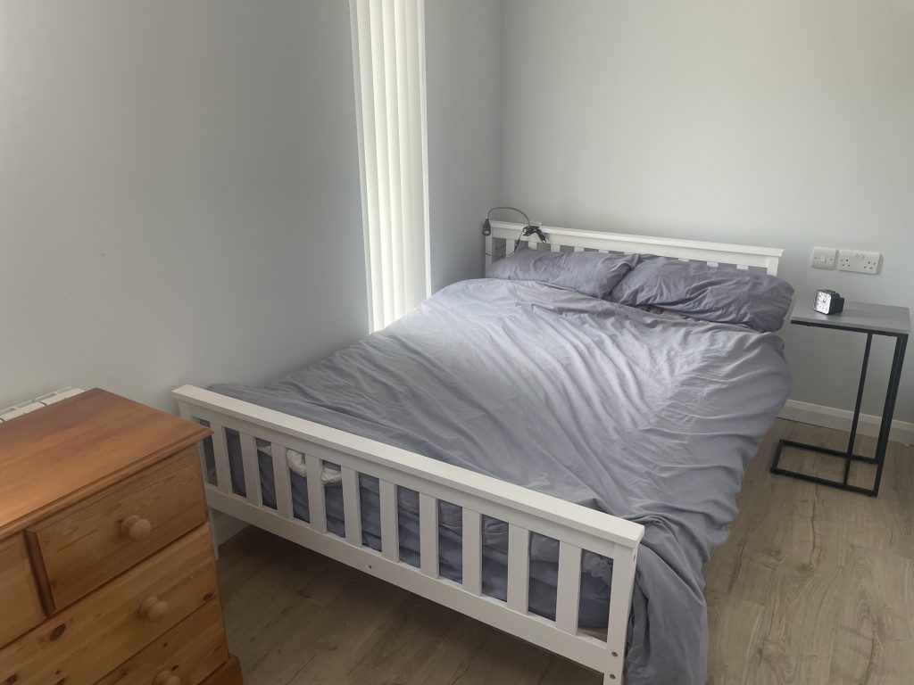 Double bedroom with clothes storage